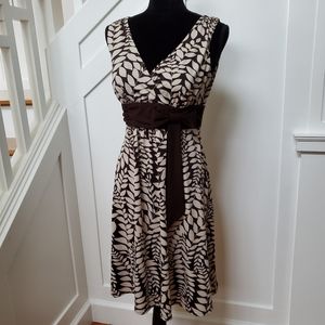 Laurel leaf cream & brown sleeveless flowy wrap neckline stretchy dress